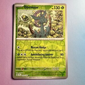 dhelmise [reverse holo] - 010/191 (common) — pokemon: surging sparks
